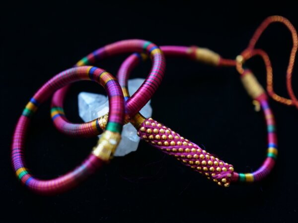 pink hand wrapped thread bangles and choker necklace