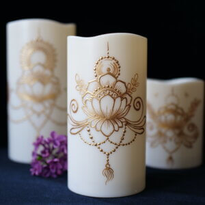 Set of 3 LED candles in various sizes, each hand painted with a lotus design