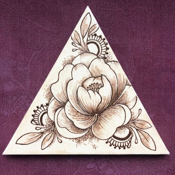 triangular canvas with peony painted in henna paste